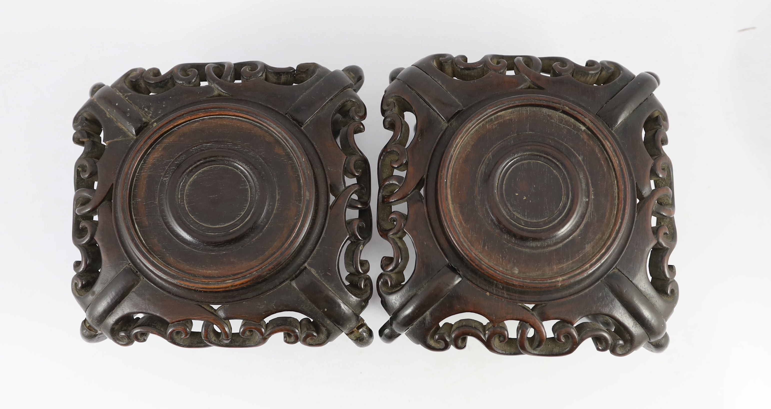 A pair of Chinese famille noire square bowls, late 19th century, one bowl broken and glued, both stands glued
